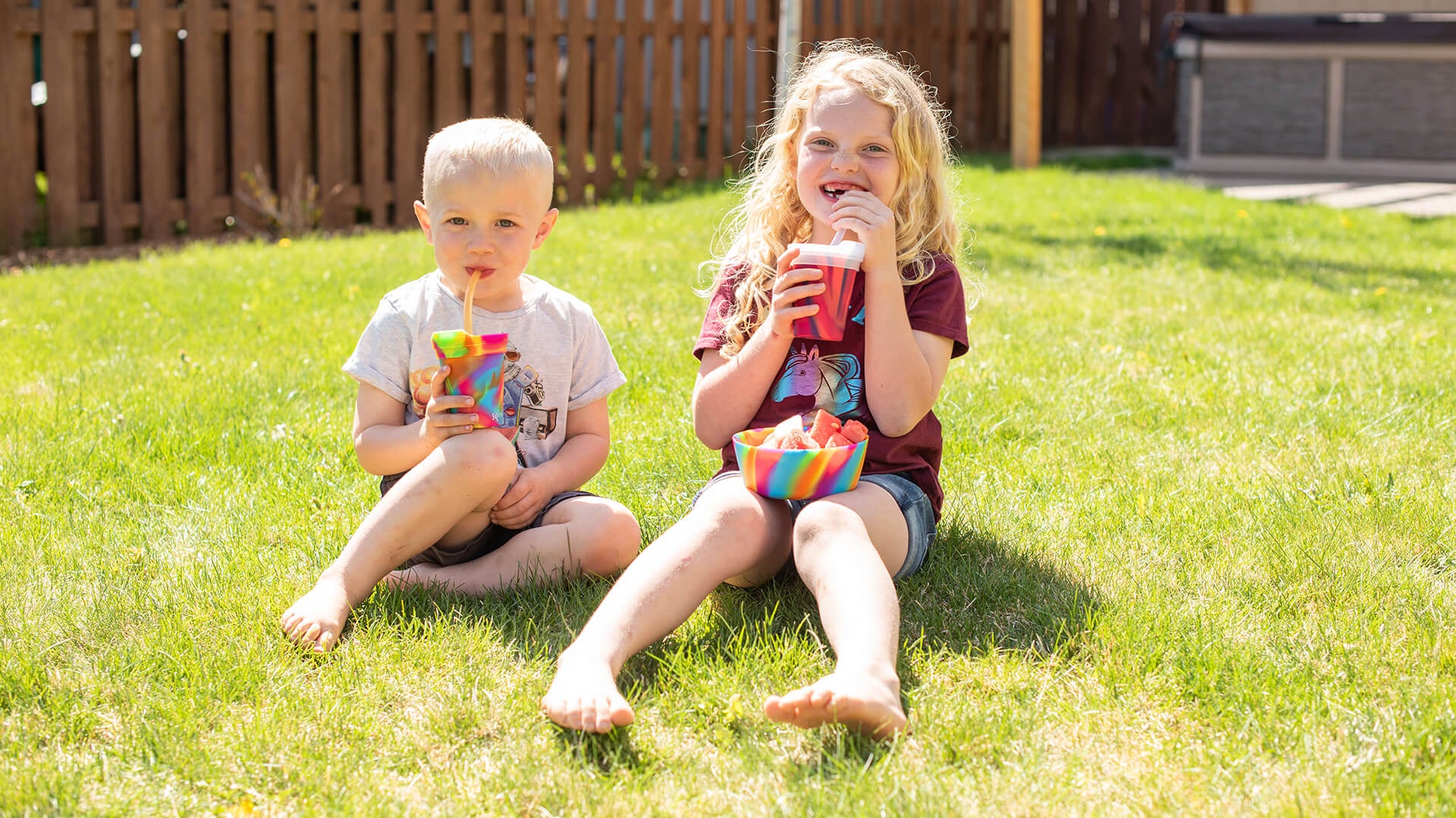 Kids drinking and eating from Silipint silicone cups and bowls