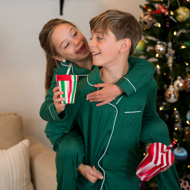 kids with peppermint and holiday straw tumblers
